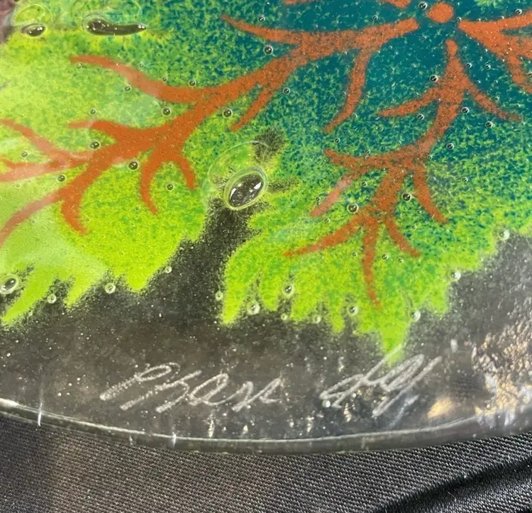 Peggy Karr, signed, fused glass plate with grapes/vines/leaves, 11” in diameter