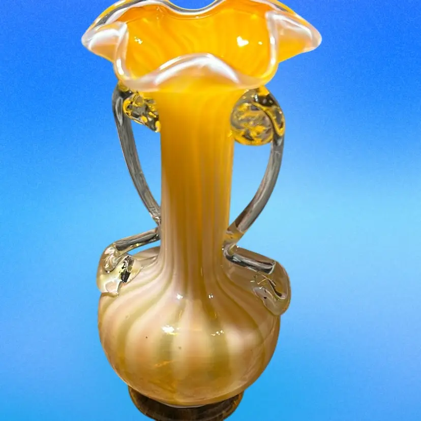 Vintage hand-blown Orange swirl art glass vase with applied handles And Ruffled Rim
