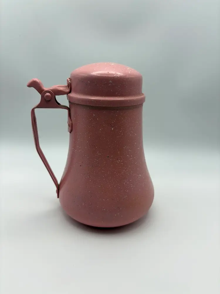 Hand painted metal pitcher