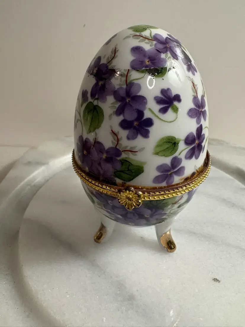 Porcelain Egg Shaped Trinket Box Hinged 3 Footed Purple violets Gold Trim 3 1/2”