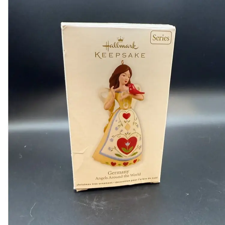 2012 Hallmark Keepsake Ornament from the "Angels Around the World" series, featuring the "Germany" angel - Original Box