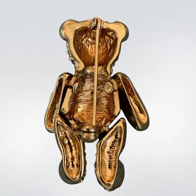 Gold Tone Articulated Bear Brooch With Red Christmas Sweater With Green Tree, White And Dark Blue Rhinestones