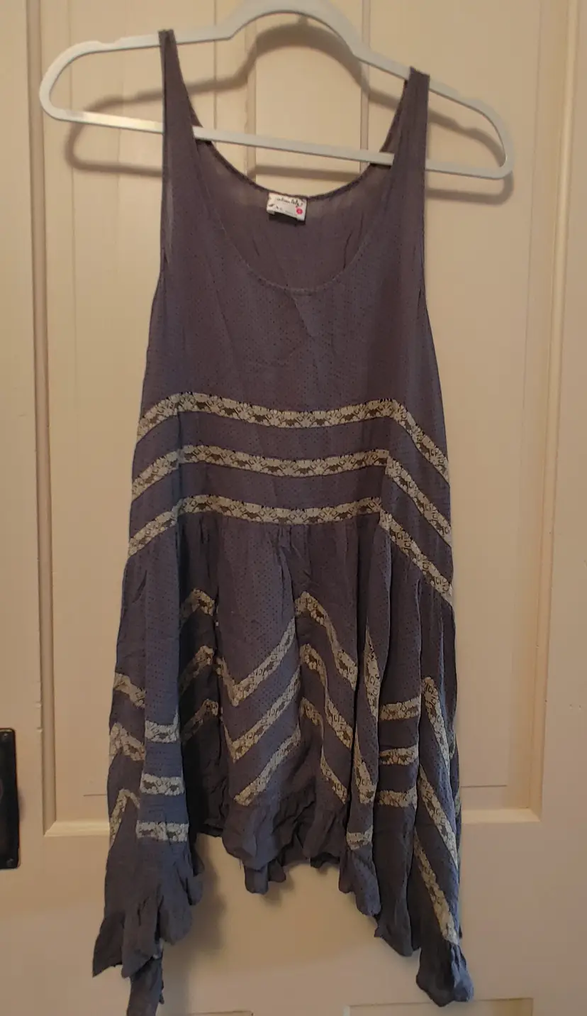Top- Brand: Intimately Free People. Size Small. Grey with lace sleeveless top. Material- 100% nylon. No callouts.