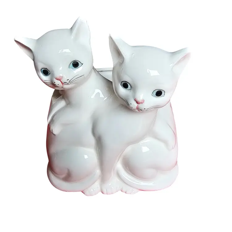 VINTAGE TWIN WHITE KITTENS WITH BLUE EYES PLANTER. MADE IN JAPAN. MANUFACTURER'S DEFECT IN GLAZE ON REAR OF ITEM. SEE PHOTOGRAPHS. 5.5X4.5X4 #G299209