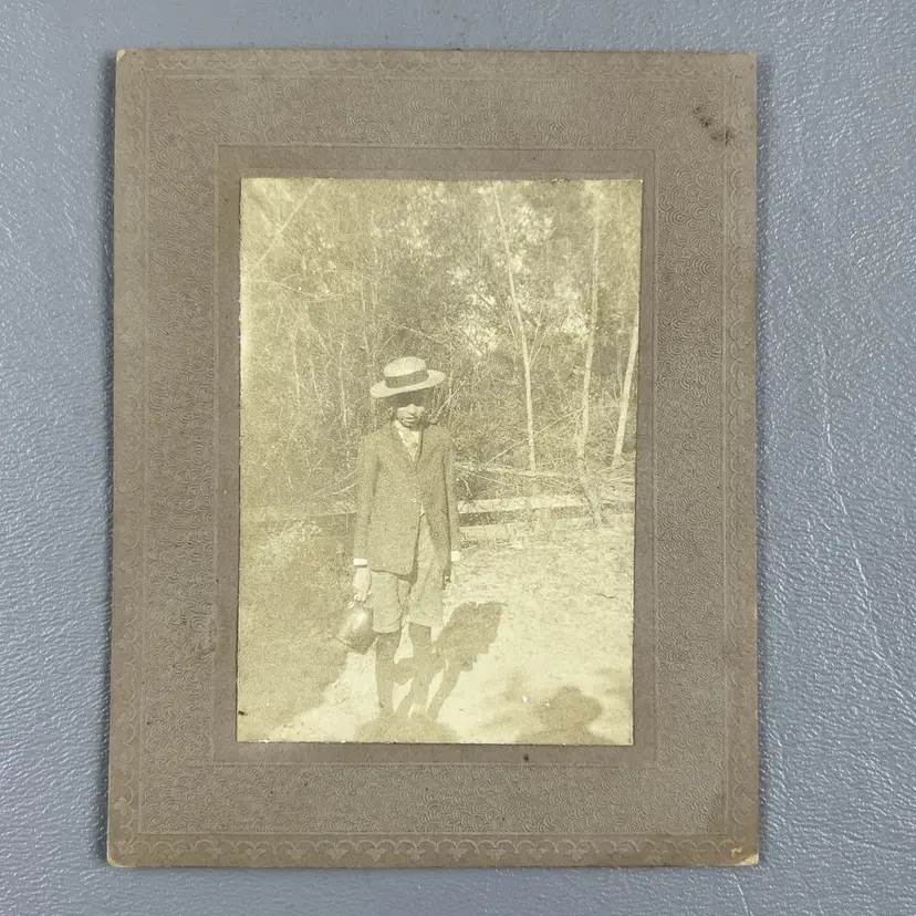 Antique Photo Child Boy Standing Outside Wearing Hat Carrying Bag 3.5x4.5" On Cardboard