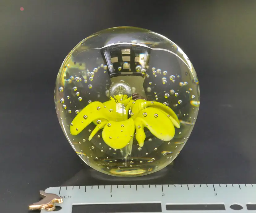 Glass Paperweight with Yellow Flower Design and Controlled Bubbles