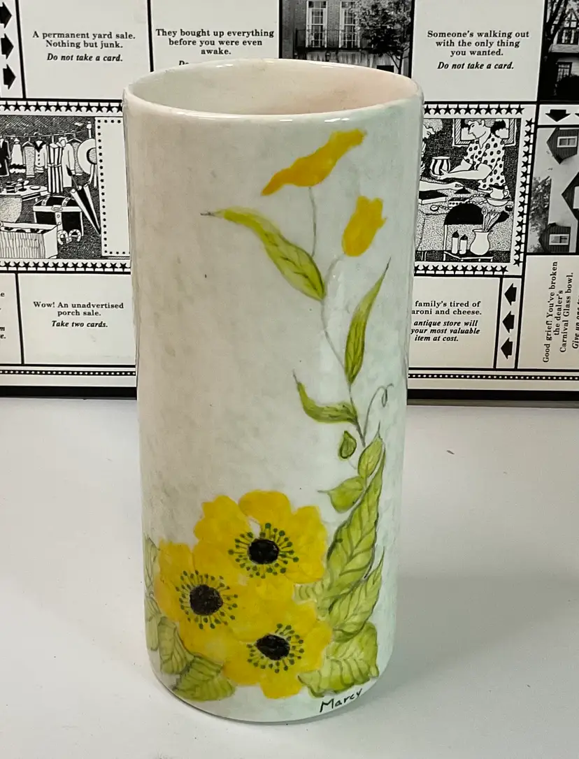 Studio Pottery Vase hand painted yellow flowers and leaves and signed by Marcy. 7 3/4” tall and 3 1/4” across top