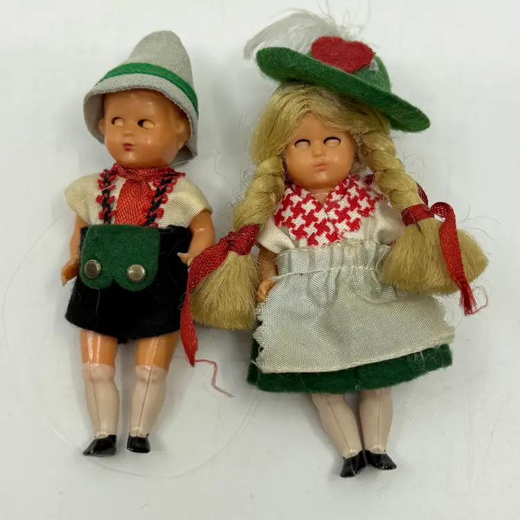 Vintage Collectible Celluloid Miniature Dolls Sleep Eyes Jointed Arms & Legs From Germany Traditional Bavarian Or Tyrolean Outfits Lederhosen For Boy Felt Hats W/Feathers For Both Christmas Tree Ornaments Or Travel Souvenirs