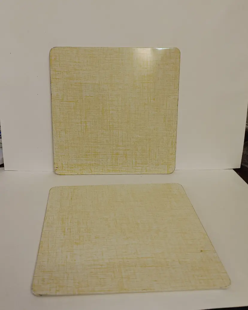 2 Yellow Metal Trivets. 7x7. Pro-Tex Product.