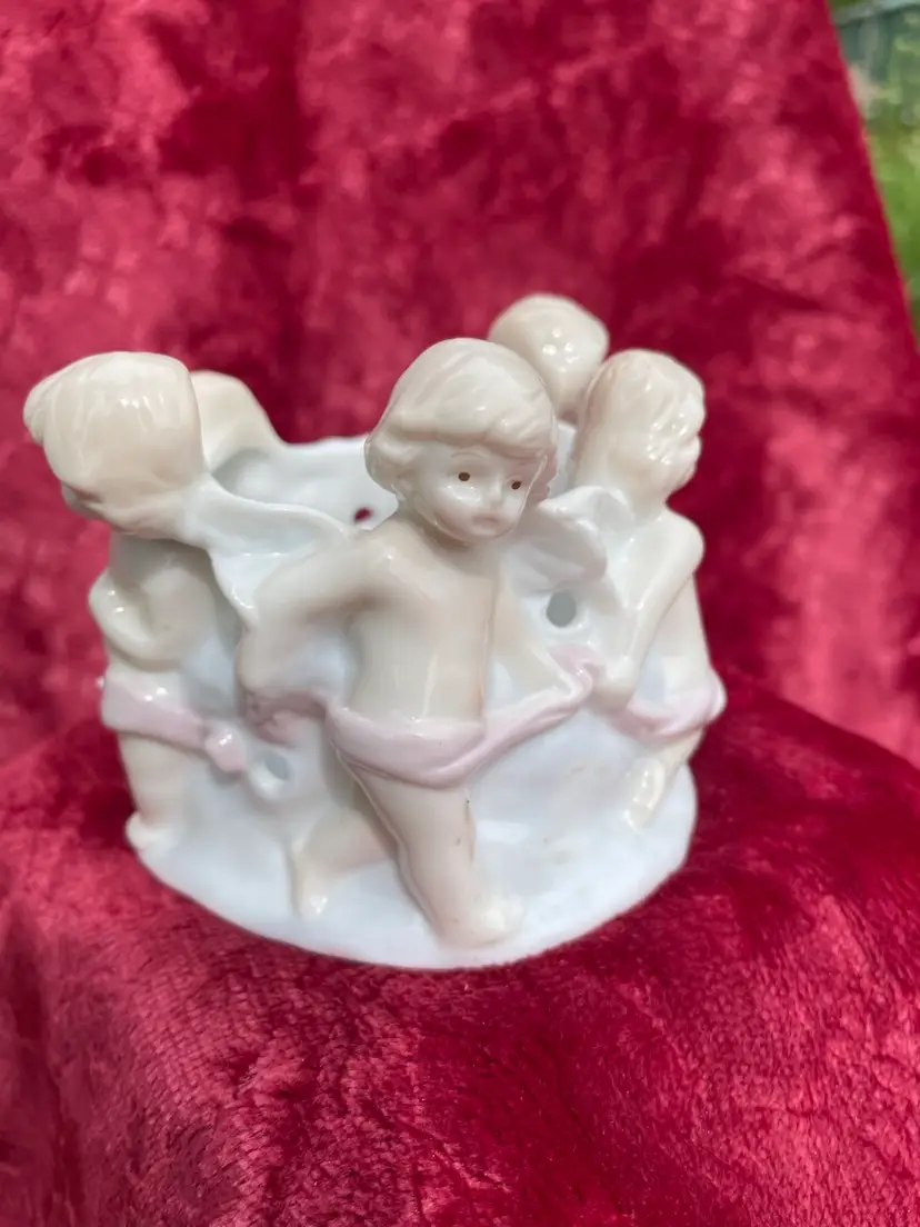 Porcelain Circle Of Cherub Candle Holder