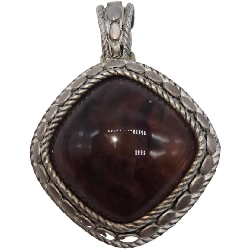Silver pendant with brown glass stone
