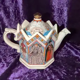 A decorative Vintage James Sadler 'Elizabeth I Queen of England' teapot, Featuring Queen Elizabeth I and Prominent figures from her reign.