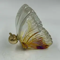 Vintage Avon Glass Butterfly Perfume Bottle With A Iridescent Shimmer.  Gold Colored Head Stopper Is Plastic.