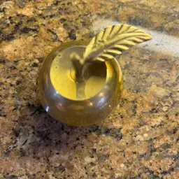 Adorable brass apple
