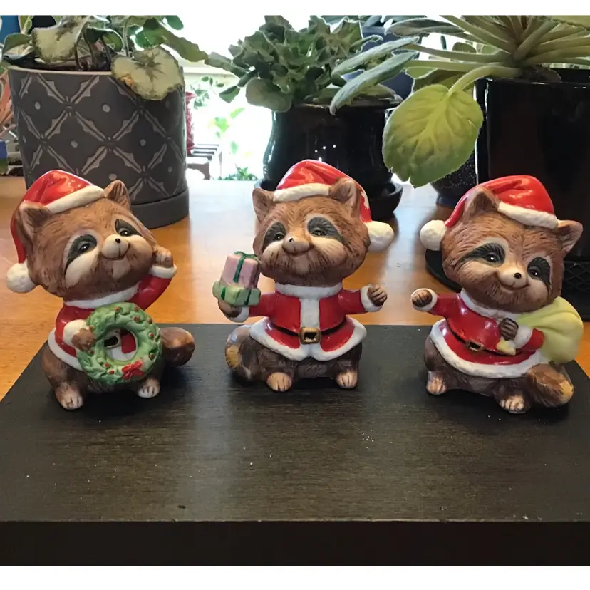 Vintage Homco Raccoon Christmas Santa figurine set of three. #5611