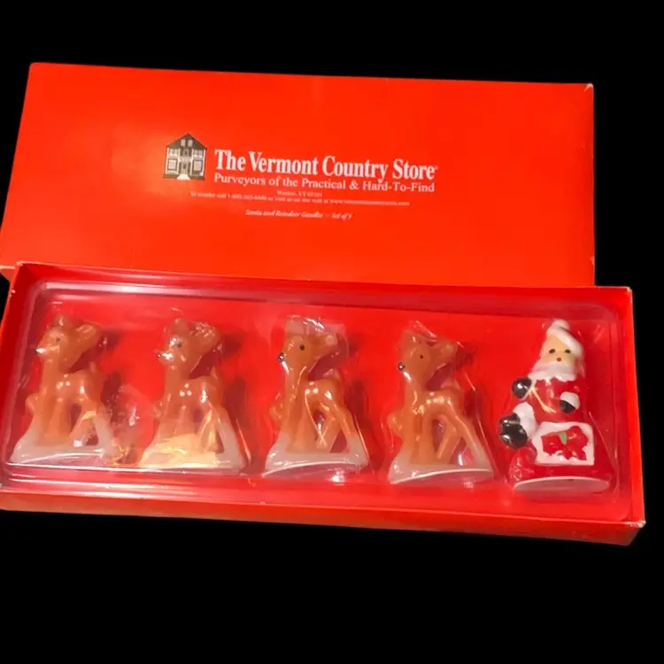 03. The Vermont Country Store Santa And Reindeer Candle Set Of Five.