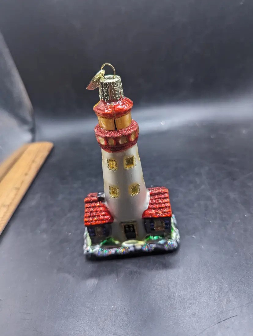 Vintage Old World Christmas Lighthouse Hand Blown Glass Ornament w/ Wreath Glitter 4.5".