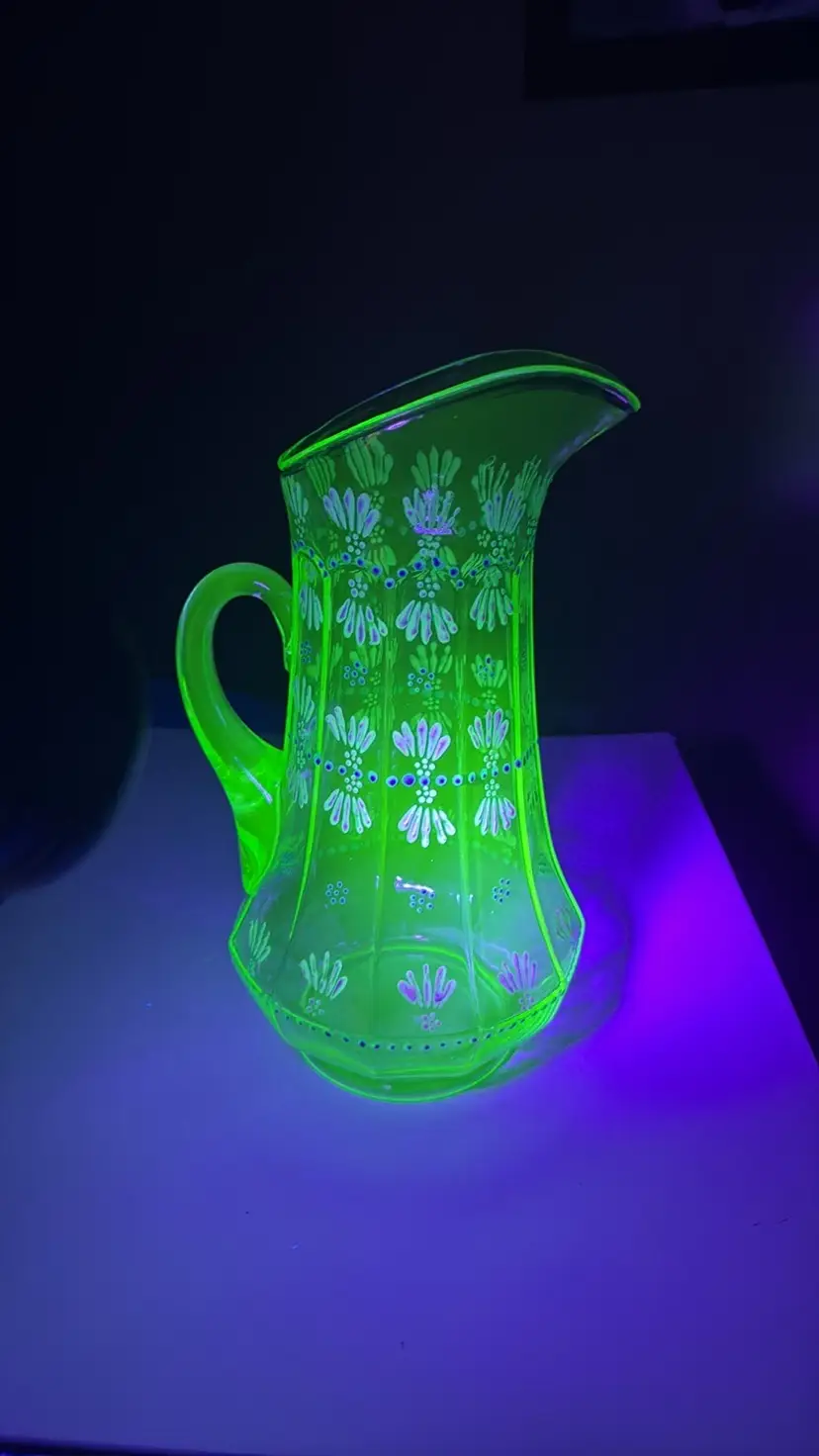 Pitcher tall hand painted uranium glass paneled 11.5” tall