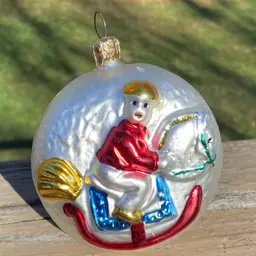 Vintage Blown Glass Christmas Ornament. Boy On Rocking Horse. 4.5”h (including hanger) x 3.5”w x 2”d.