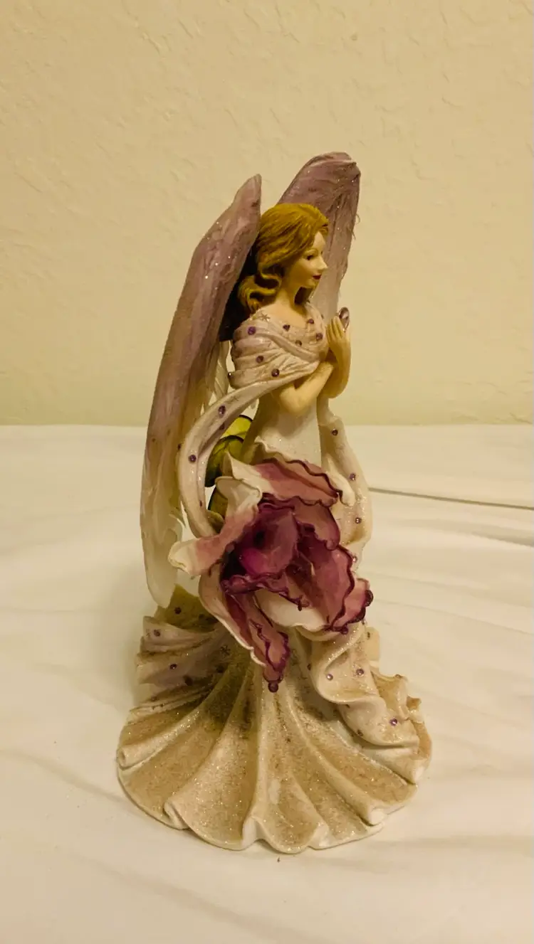 42.  Gorgeous 7.5” Tall Lavender And White Color Angel Figurine “Heavenly Hands
That Heal from the Angels of Healing
Collection Sculpture No._7265F - Limited to 95 casting days.
A FINE ADULT COLLECTIBLE, NOT INTENDED FOR CHILDREN
© HC. All Rights Reserved.
09-00832-001