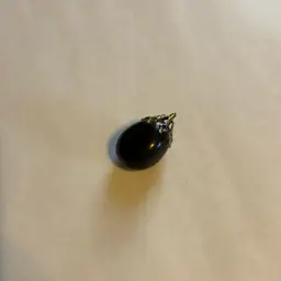 Black Stone Pendant With Silver Tone Hanger