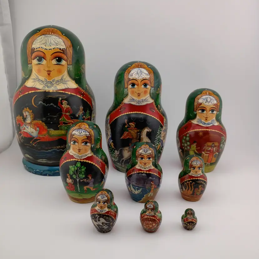Signed 9" tall Russian nesting dolls, set of 9 (littlest missing)