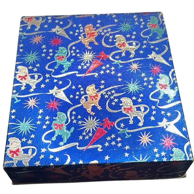 Vintage Bourjois "Evening in Paris" talcum powder and cologne set In Original Box. Items Unused. 1928-1950.  Excellent Condition Box, 76 Yrs Old And Looks Brand New!!! Valentines Day.  Full Unopened Bottles. See Pictures. 8x8 Box With Poodles, Stars, Umbrellas… Foil Print. Includes Talcum Powder, Cologne, And Purse Size Bottle.