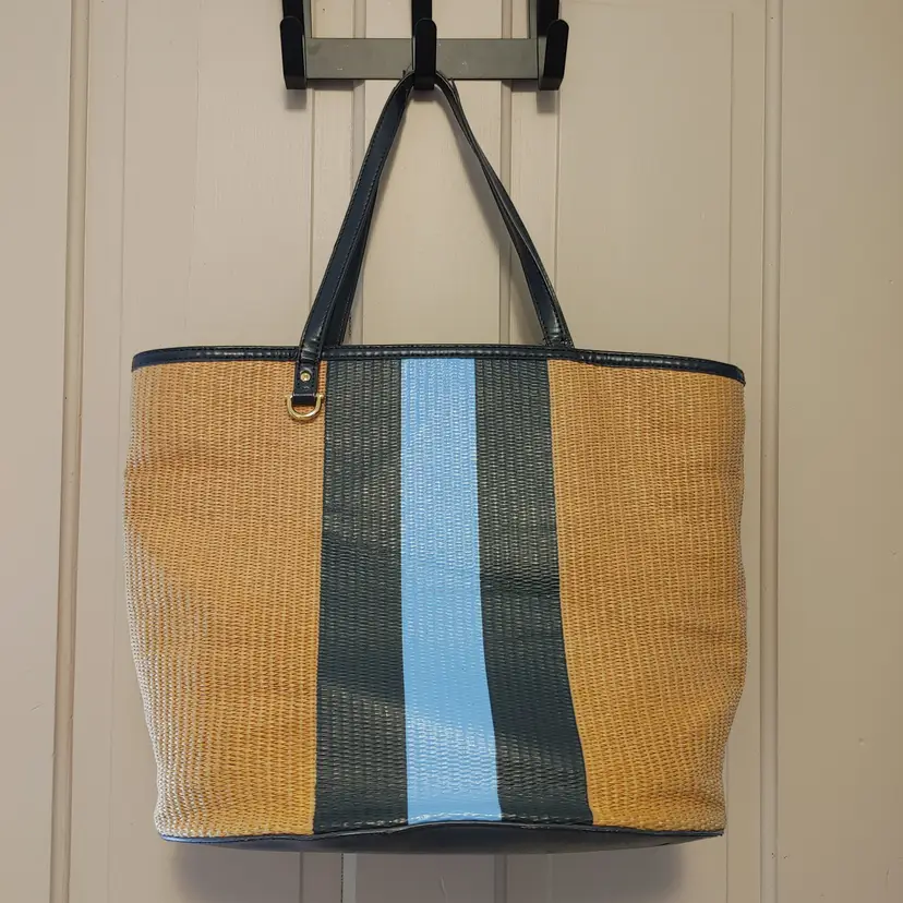 Draper James x Crate & Barrel navy and straw tote. Pre-owned. Straps show some wear.