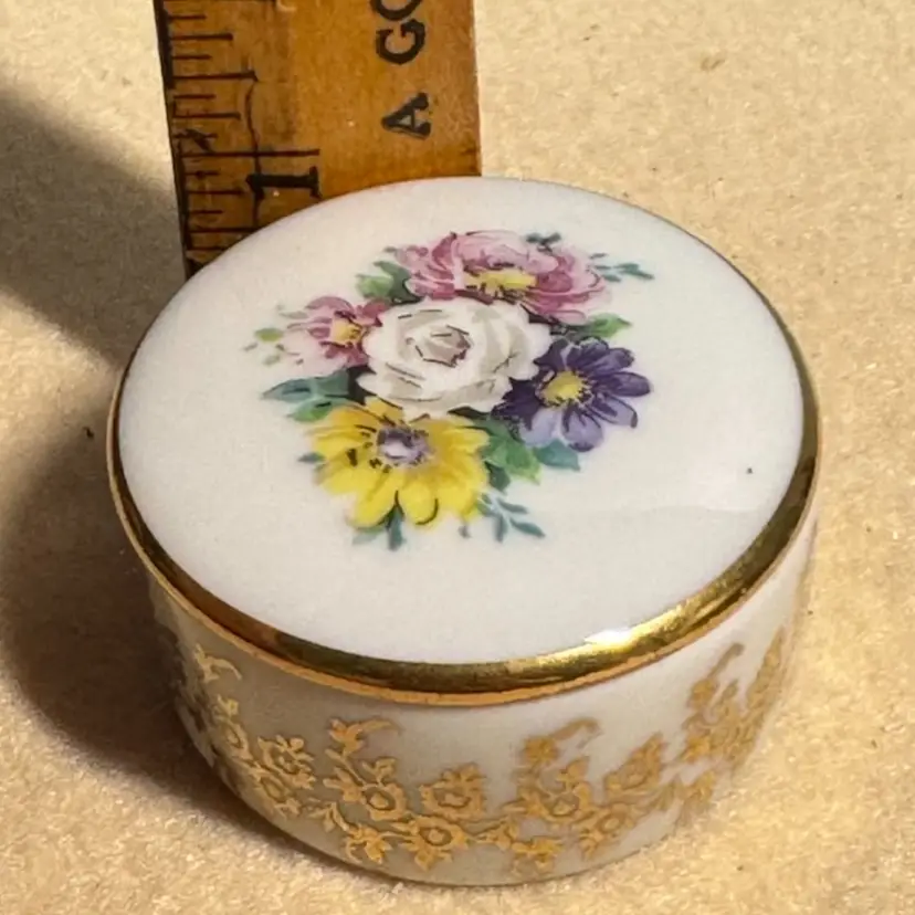 Vintage Limoges France porcelain trinket box with floral bouquet and gold trim