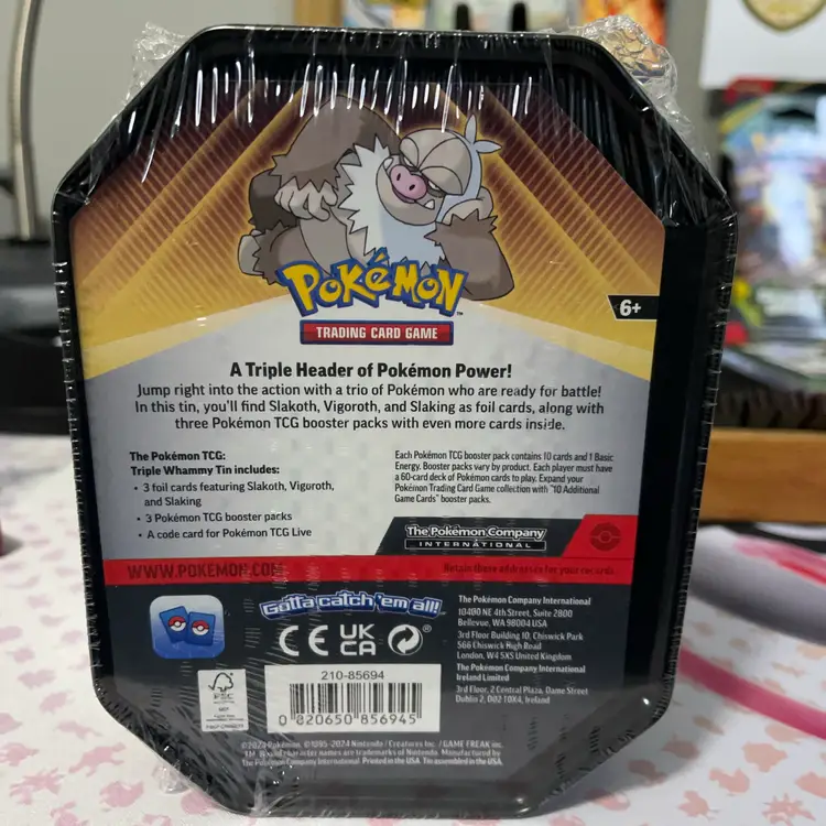 Pokémon TCG Triple Whammy Collector Tin featuring the character Slaking.