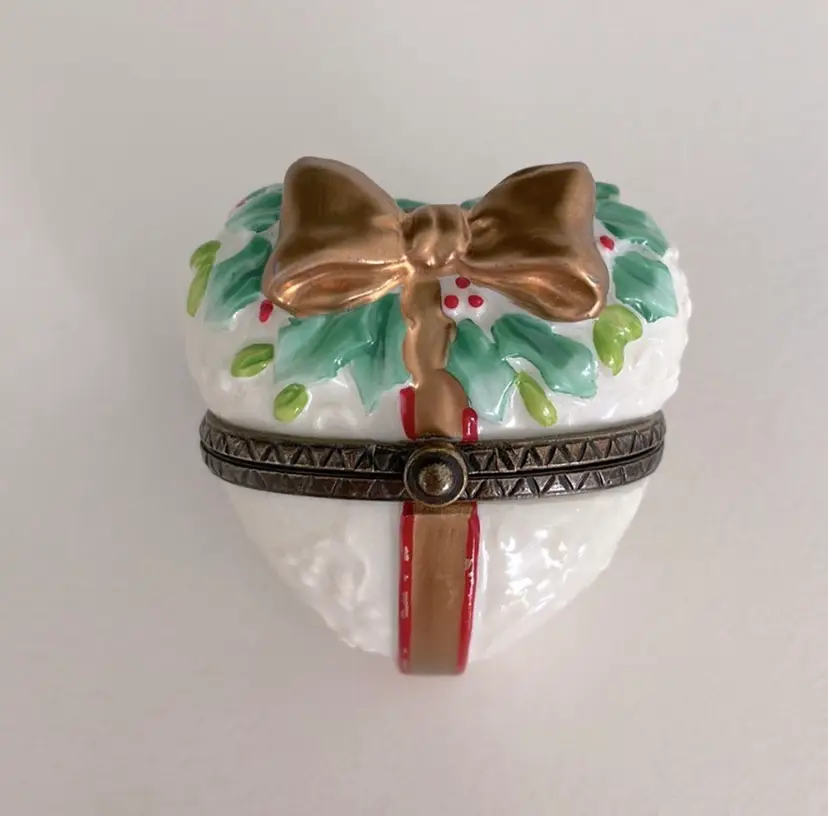 Porcelain, hinged, heart shaped trinket box with gold bow,  holly and berries