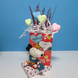 vintage Snoopy figure with crafted Valentine base decor