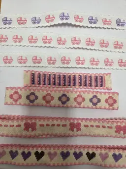 New 7 Piece Lot of Cross-stitched Ribband Girl Themed Pink and Purple to Add To Crafts