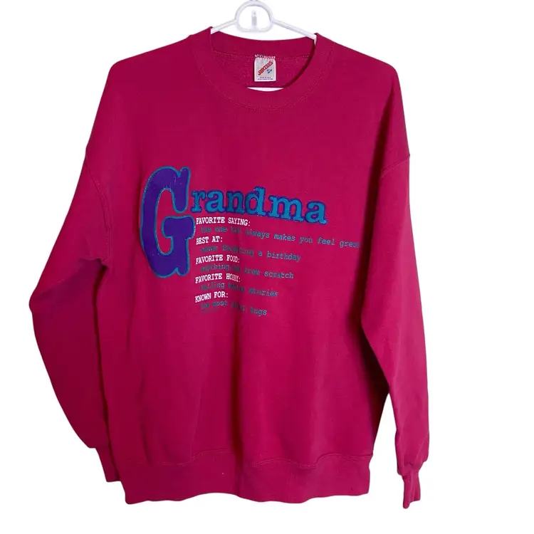 This image shows a vintage 1991 Jerzees pink crewneck sweatshirt featuring "Grandma" graphics and embroidered text