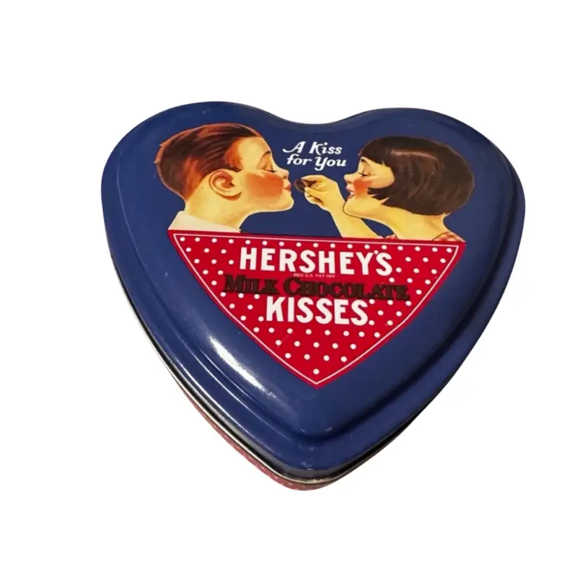 A vintage Hershey's Kisses "A Kiss For You" heart-shaped collectible tin