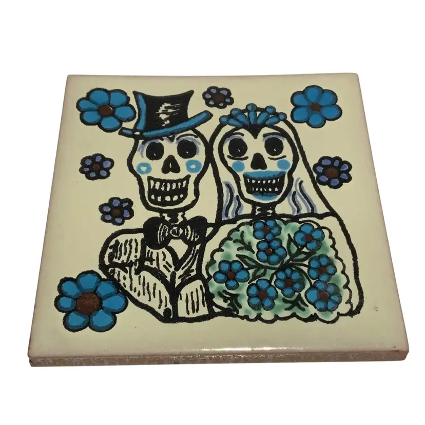 Hand Crafted Talavera Mexican Tile Mosaic Day of the Dead Cream Color Background Featuring A Catrina Wedding Couple With Blue Flowers 4.5” By 4.5” Red Clay
