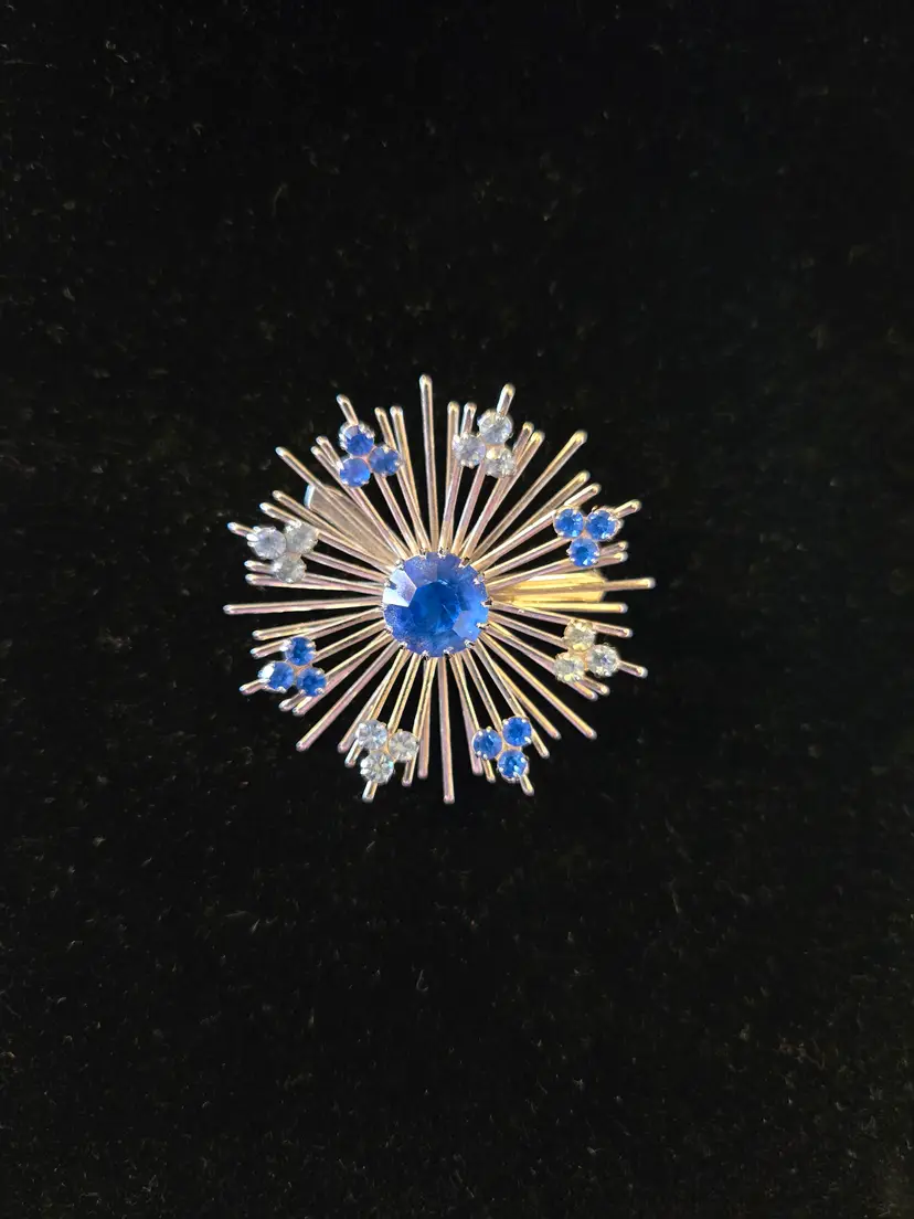 Silvertone Sarah Coventry Starburst Brooch with Blue Rhinestones