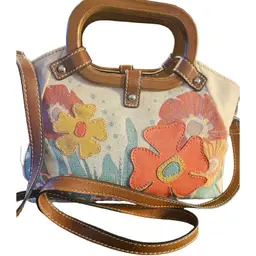 Relic canvas floral purse with a wood top handle and boho patchwork design