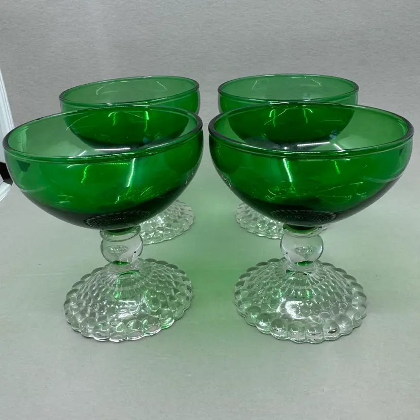 Set of four vintage Anchor Hocking green glass sherbet coupes with bubble-foot bases, 1950-60s