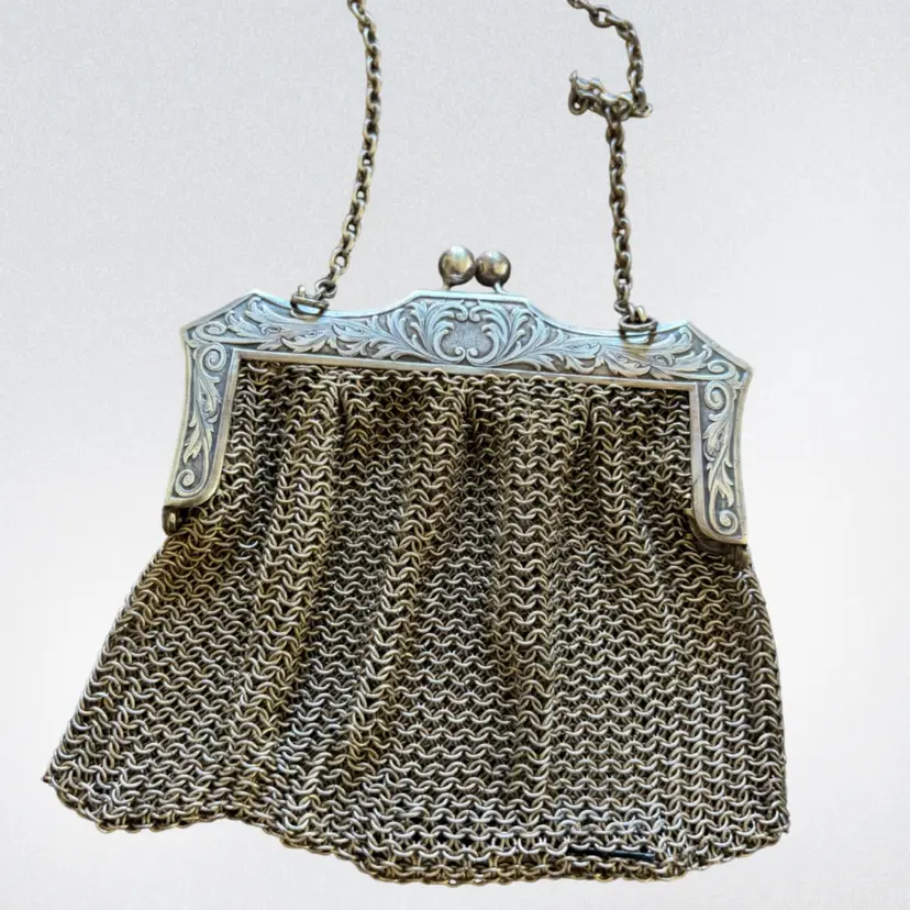 Beautiful German silver (made Of Copper, Nickel And Zinc) Antique Mesh Evening Purse With Kiss Lock Ball Clasp Only Call Out Is Mesh Is Loose In The One Side. Very Good Condition For This Beautiful Antique