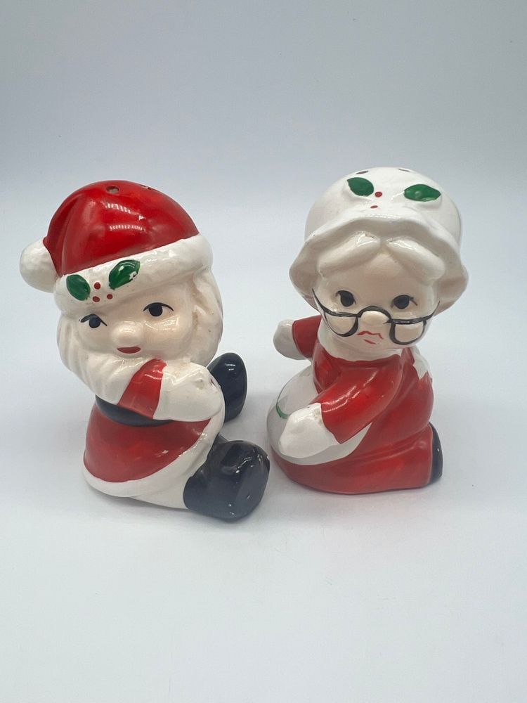 Vintage Ceramic Hugging Santa & Mrs. Claus S&P Set