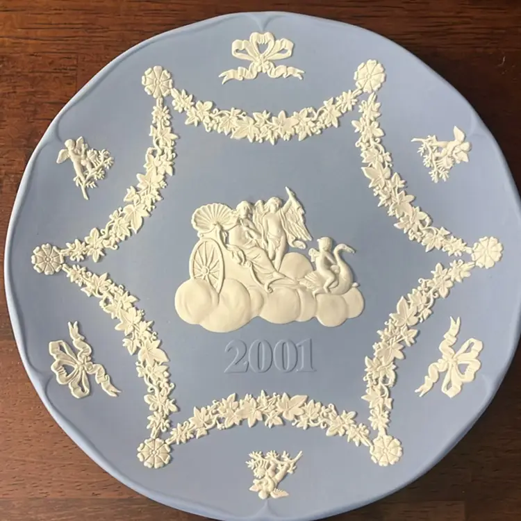 A Wedgwood blue Jasperware 2001 annual decorative plate. 7” In Box