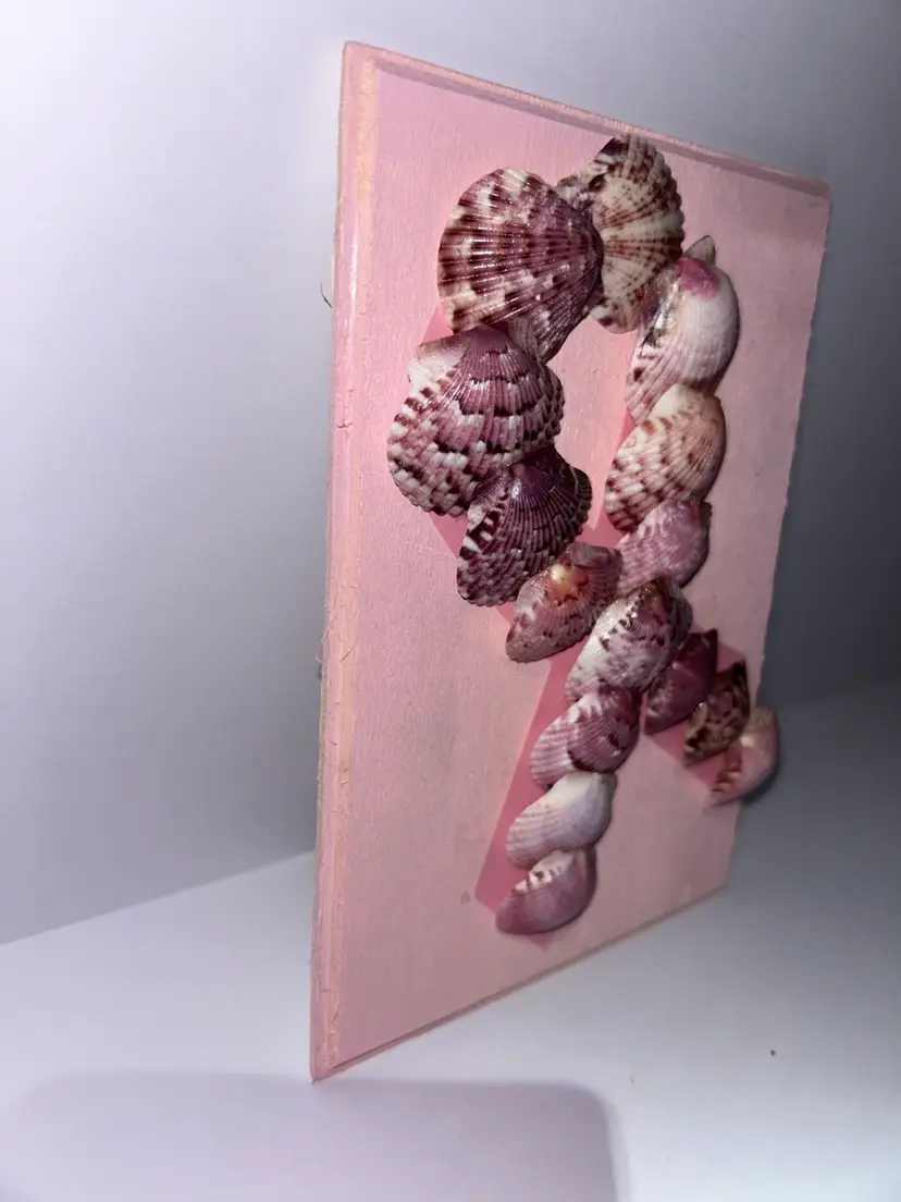 Breast Cancer Awareness Ribbon Made Out Of Seashells