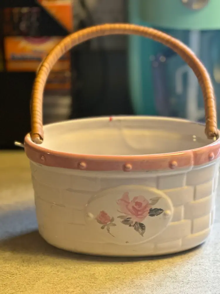 Ceramic basket with rattan handle by Pfaltzgraff, Tea Rose pattern.