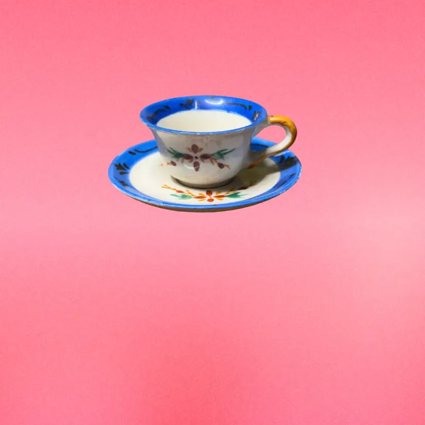 24. Mini Enamel Made In Japan Tea Cup, And Saucer