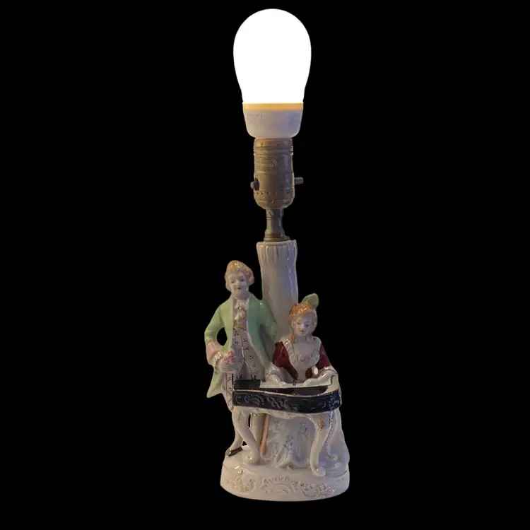 Vintage Porcelain Figurine Lovely Lamp With Couple At The Piano. In Working Condition.