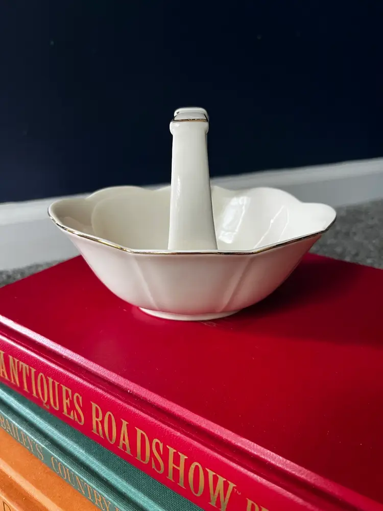 Vintage Savannah Ivory Porcelain Basket with a floral pattern and bow handle with gold accents