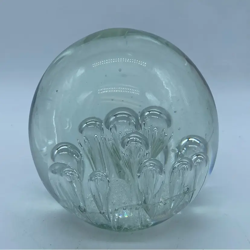 #0046 Large clear glass paperweight with internal rising bubble inclusions.