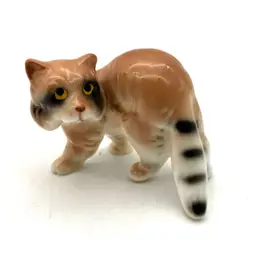 21 - Porcelain Raccoon Figurine 1.75”