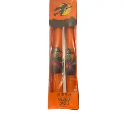 vintage 10-inch Halloween taper candles, featuring embossed witch and pumpkin designs, manufactured in Hong Kong